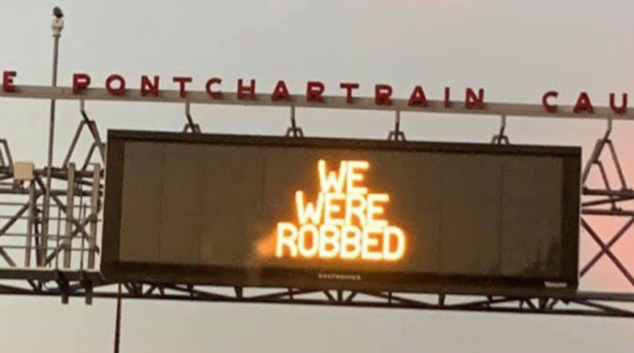 saints-new-orleans-highway-sign-we-were-robbed